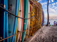 Colorful Surfboards Stacked Up On Waikiki Beach At Sunset. Wall Decal
