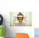 Woman with smartphone and crazy eyes Wall Mural