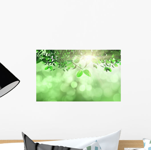 Leaves and grass against a defocussed background Wall Mural