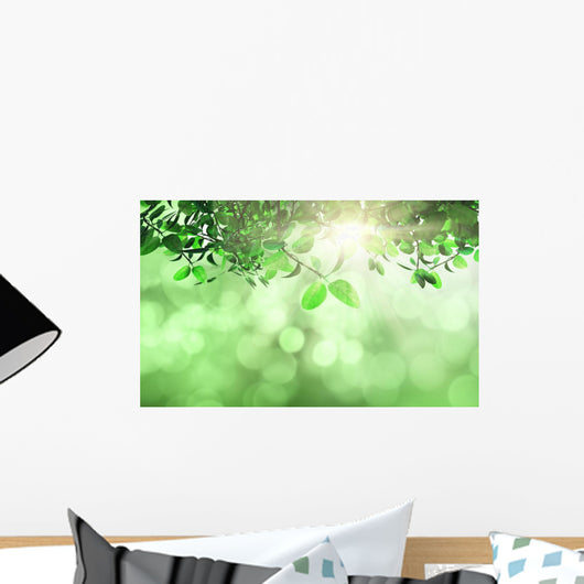 Leaves and grass against a defocussed background Wall Mural
