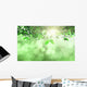 Leaves and grass against a defocussed background Wall Mural