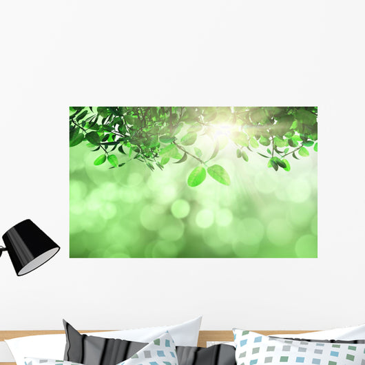 Leaves and grass against a defocussed background Wall Mural