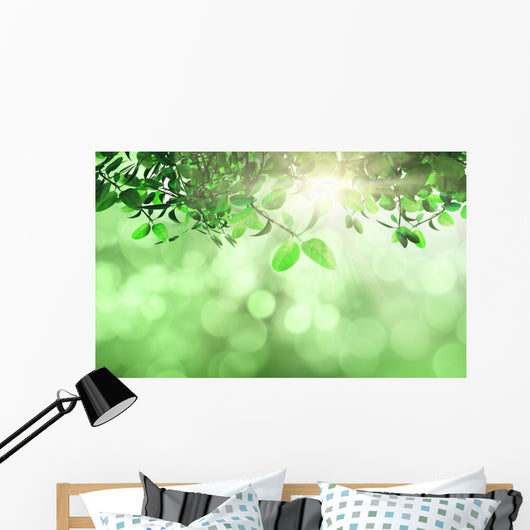 Leaves and grass against a defocussed background Wall Mural