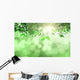 Leaves and grass against a defocussed background Wall Mural