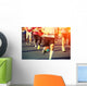 marathon runner legs running on city street Wall Mural