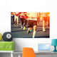marathon runner legs running on city street Wall Mural