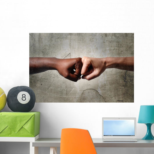 black African American ethnic fist vs white Caucasian Wall Mural