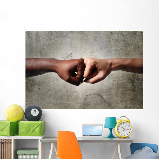 black African American ethnic fist vs white Caucasian Wall Mural