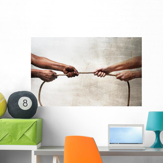 black ethnicity hands pulling rope against white Caucasian race Wall Mural