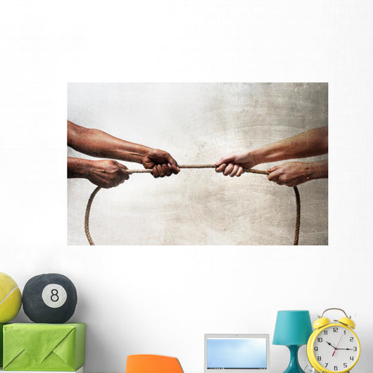 black ethnicity hands pulling rope against white Caucasian race Wall Mural