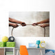 black ethnicity hands pulling rope against white Caucasian race Wall Mural