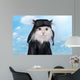 cat in a suit against the sky pilot Wall Mural