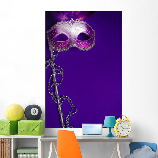 Purple Mardi-Gras or Venetian mask on purple background Wall Mural