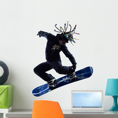 Snowboarder Dreads Silhouette Wall Decal shown on a wall