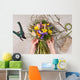 hands of florist making bouquet spring flowers Wall Mural
