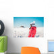 Woman explorer skier looking the snowy horizon Wall Mural