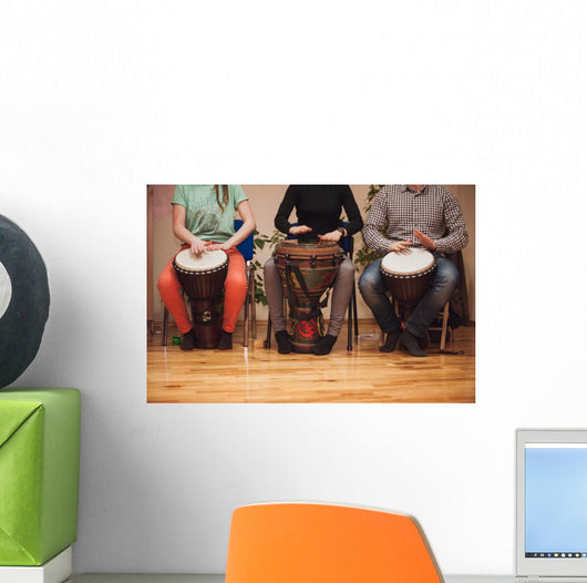 Group of Jambe drummers playing Wall Mural