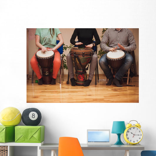 Group of Jambe drummers playing Wall Mural