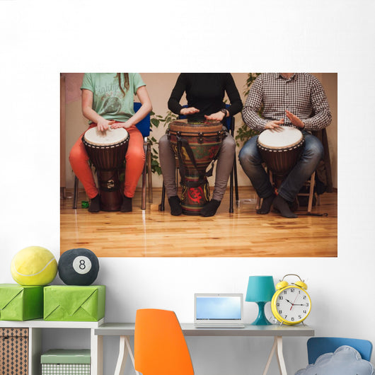 Group of Jambe drummers playing Wall Mural