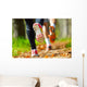 Young couple jogging in park at morning. Health and fitness. Wall Mural