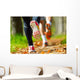 Young couple jogging in park at morning. Health and fitness. Wall Mural