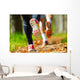 Young couple jogging in park at morning. Health and fitness. Wall Mural