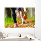 Young couple jogging in park at morning. Health and fitness. Wall Mural