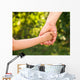 father holding  daughter hand Wall Mural