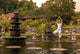 Young Women Near Water Palace Tirthagangga. Bali Indonesia Wall Decal