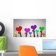 Holding Rainbow Hearts Wall Mural