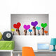 Holding Rainbow Hearts Wall Mural