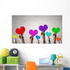 Holding Rainbow Hearts Wall Mural