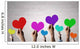 Holding Rainbow Hearts Wall Mural