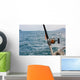 Fishing rod and reel on a boat Wall Mural