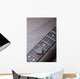 Guitar frets with strings and mediator on dark brown surface Wall Mural