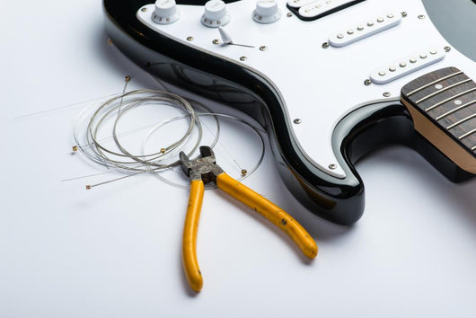 Electric Guitar With Yellow Nippers And Strings Wall Decal