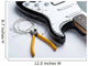Electric guitar with yellow nippers and strings Wall Mural