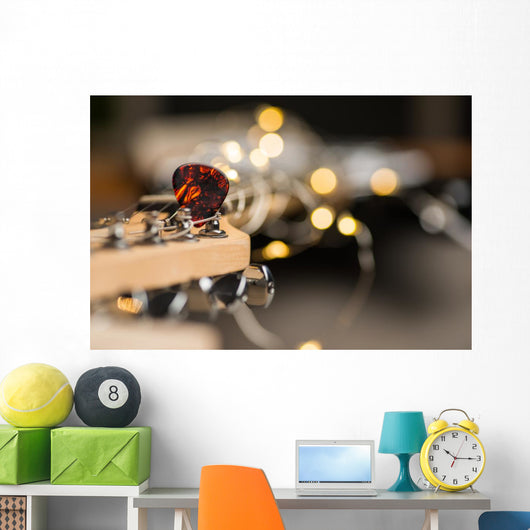 Guitar frets with mediator, strings and lights Wall Mural