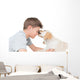 Puppy Licking Boy over Wall Decal