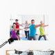 People doing warrior pose in yoga class Wall Decal
