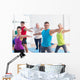 People doing warrior pose in yoga class Wall Decal