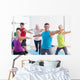 People doing warrior pose in yoga class Wall Decal
