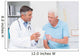 Doctor explaining prescription to senior patient Wall Mural