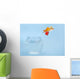 Goldfisch springt aus Glas Wall Mural