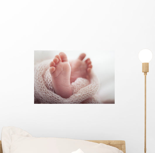 Newborn baby Feet Wall Mural