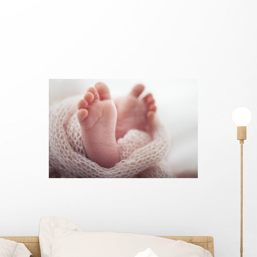 Newborn baby Feet Wall Mural