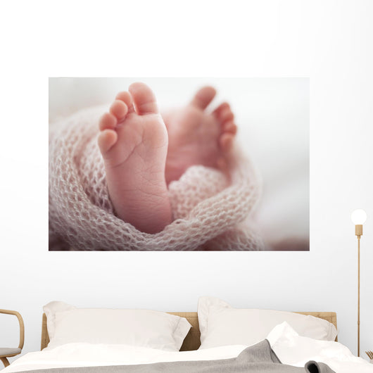 Newborn baby Feet Wall Mural