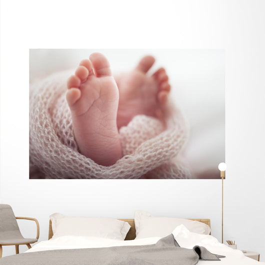 Newborn baby Feet Wall Mural