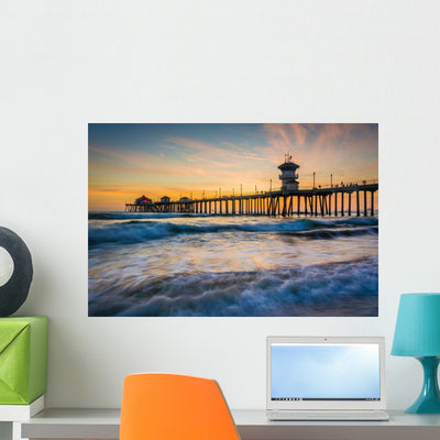 Huntington Pier Sunset Wall Decal shown on a wall