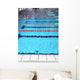 swimming pool with blue water and the swimming lanes Wall Mural